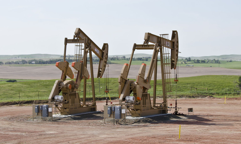 Pictured is a set of oil wells in McKenzie County, North Dakota. Oil is credited with being a driving force behind the state's economic growth.