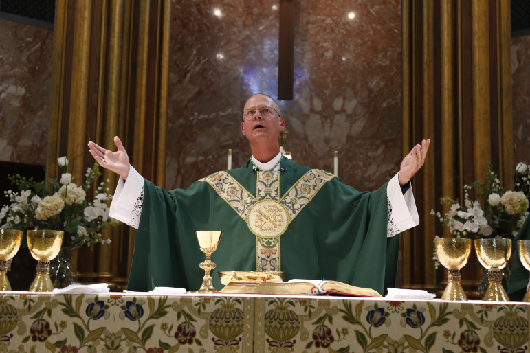Bishop Paul Etienne during Sunday Mass recently at Saint Mary's Cathedral in Cheyenne, Wyo.