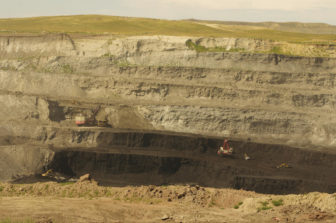 Shovels scoop coal at Alpha Natural Resources' Eagle Butte mine in this file photo from August 2014.